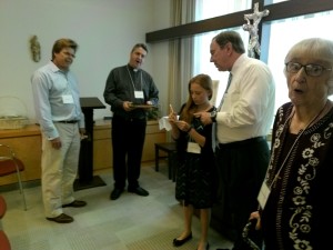 Partners gather to view the first class relic of St. Therese of Lisieux.