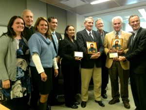 Ed Robinson and Dana Robinson (far right) Accept The 2013 Joseph Gerard Award accompanied by members of their family.  