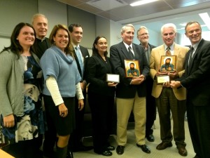 Ed Robinson and Dana Robinson (far right) Accept The 2013 Joseph Gerard Award accompanied by members of their family.